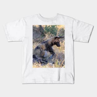 Wild dog sitting with its pack Kids T-Shirt